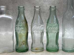 Glass bottles, including Mortein Plus - 3