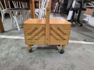 Sewaids mid-century cantilever timber sewing box on castors