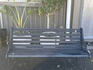 Black cast iron garden bench
