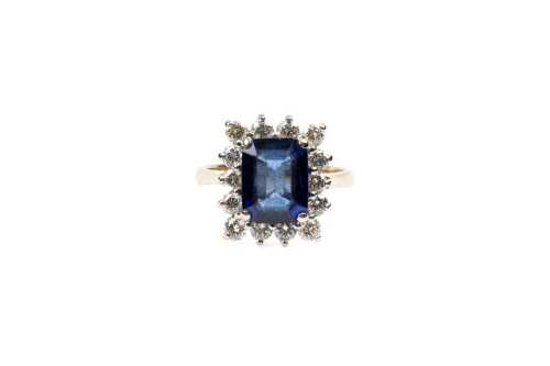 A sapphire and diamond ring in 18 carat yellow gold