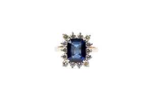 A sapphire and diamond ring in 18 carat yellow gold