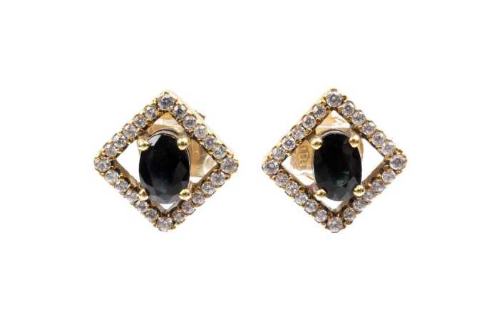 A pair of sapphire and diamond earrings in 18 carat yellow gold