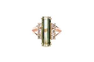 A green tourmaline and diamond ring in 9 carat rose gold