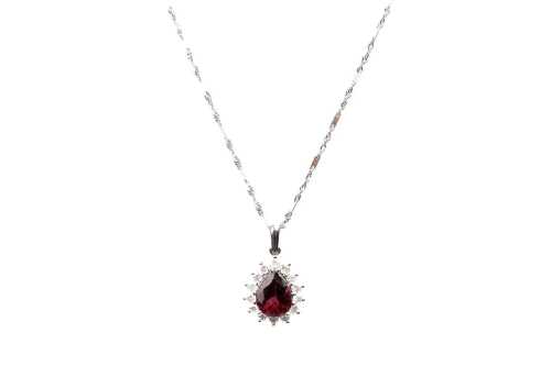 A red tourmaline and diamond pendant and necklace in 18 carat white gold
