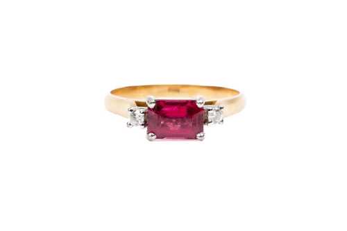 A red spinel and diamond ring in 18 carat yellow gold