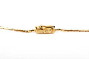A ruby and diamond necklace in 18 carat yellow gold - 6