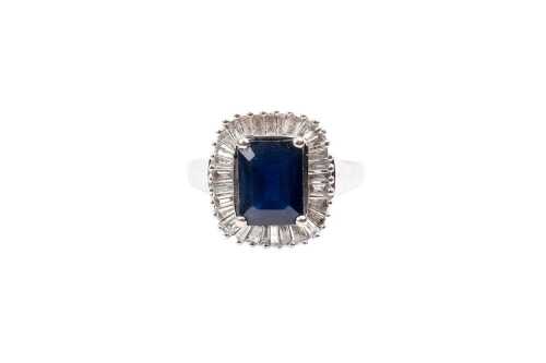 A sapphire and diamond ring in 14 carat white gold
