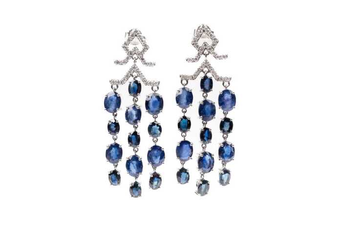 A pair of sapphire and diamond earrings in 14 carat white gold