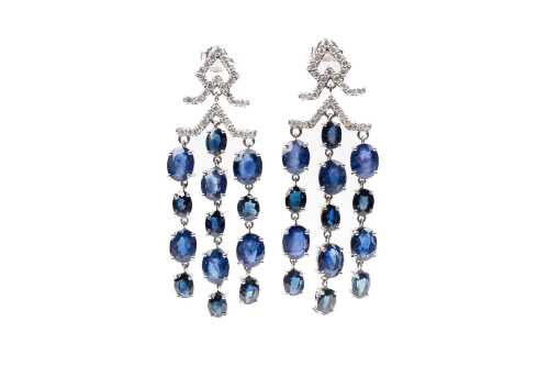 A pair of sapphire and diamond earrings in 14 carat white gold