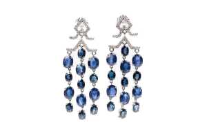 A pair of sapphire and diamond earrings in 14 carat white gold