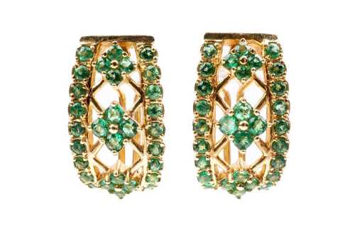 A pair of emerald earrings in 14 carat yellow gold