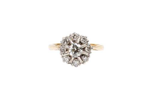 A vintage diamond cluster ring in 18 carat yellow gold and platinum