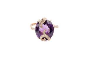 An amethyst and diamond ring in 18 carat rose gold