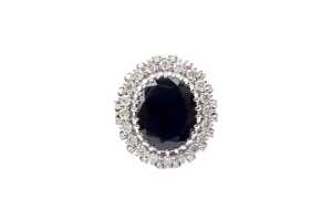A sapphire and diamond ring in 14 carat white gold