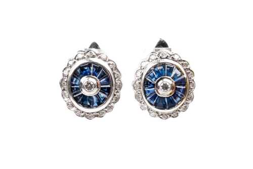 A pair of sapphire and diamond earrings in 18 carat white gold