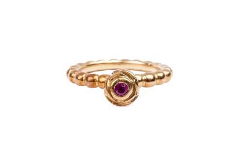 A Pandora ruby bubble ring in 14 carat yellow gold