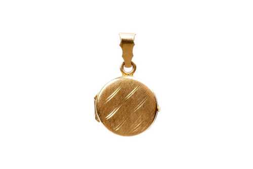 A round patterned locket in 18 carat yellow gold
