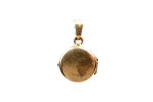 A round patterned locket in 18 carat yellow gold - 3