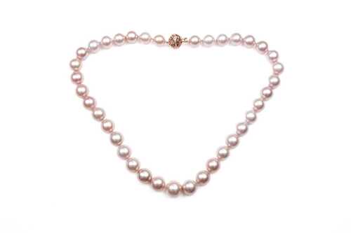 A strand of pink freshwater pearls to a 14 carat rose gold diamond clasp