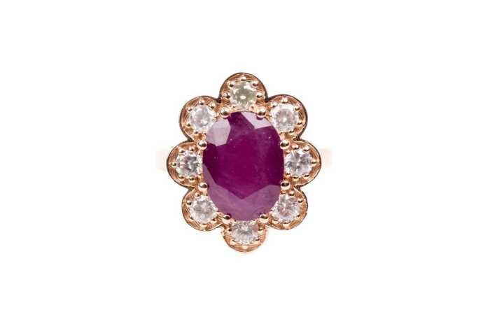 A ruby and diamond ring in 9 carat rose gold