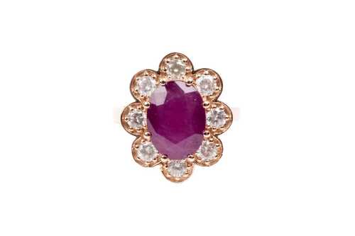 A ruby and diamond ring in 9 carat rose gold