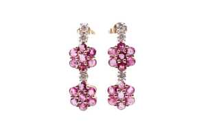 A pair of pink sapphire and diamond earrings in 14 carat yellow gold