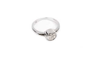 A bezel set solitaire in 18ct white gold - 2