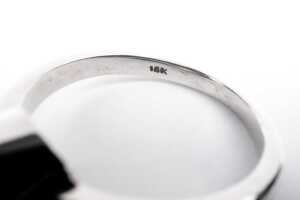 A bezel set solitaire in 18ct white gold - 5