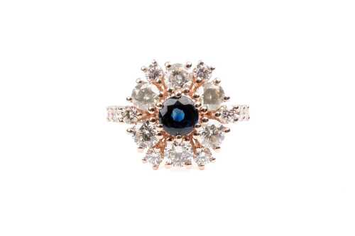 A sapphire and diamond ring in 9 carat rose gold