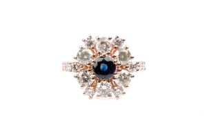 A sapphire and diamond ring in 9 carat rose gold