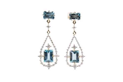 A pair of aquamarine and diamond earrings in 14 carat yellow gold