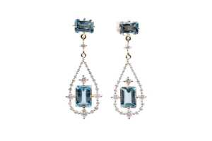 A pair of aquamarine and diamond earrings in 14 carat yellow gold