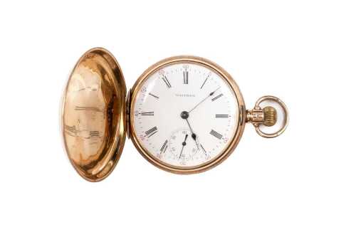 An antique Waltham pocket watch in 14 carat yellow gold