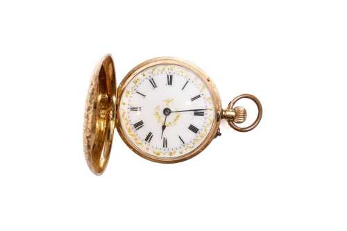 An antique pocket watch in 14 carat yellow gold