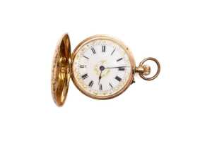 An antique pocket watch in 14 carat yellow gold