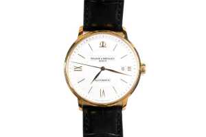 A Baume and Mercier Classima automatic in 18 carat yellow gold