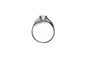 A diamond ring in platinum. - 4