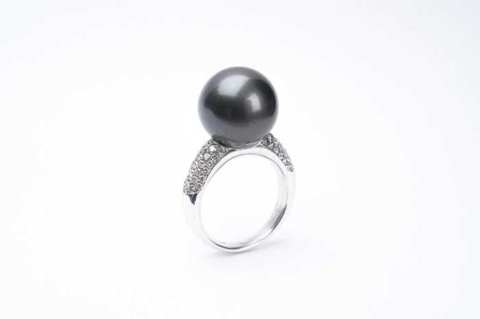 A Tahitian pearl and diamond ring in 18 carat white gold