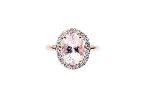 A morganite and diamond ring in 14 carat rose gold