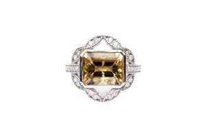 A heliodor and diamond ring in 14 carat white gold