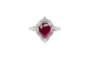A ruby and diamond ring in 14 carat white gold