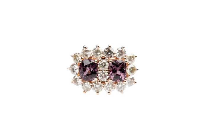 A purple tourmaline and diamond ring in 9 carat rose gold.