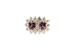 A purple tourmaline and diamond ring in 9 carat rose gold.