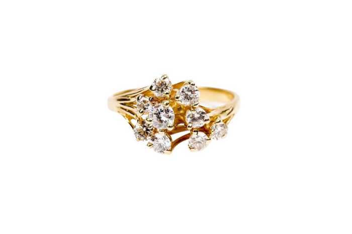 A diamond ring in 18 carat yellow gold