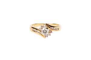 A diamond ring in 18 carat yellow gold