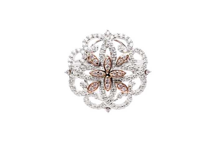 A pink and white diamond ring in 14 carat white and rose gold