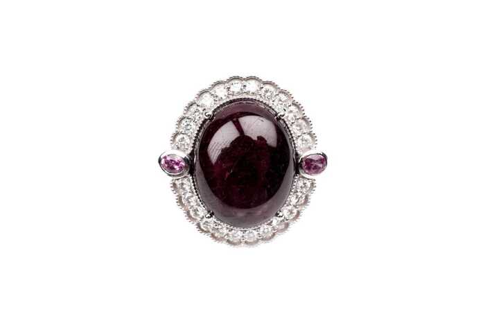A ruby, pink sapphire, and diamond ring in 18 carat white gold