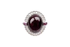 A ruby, pink sapphire, and diamond ring in 18 carat white gold