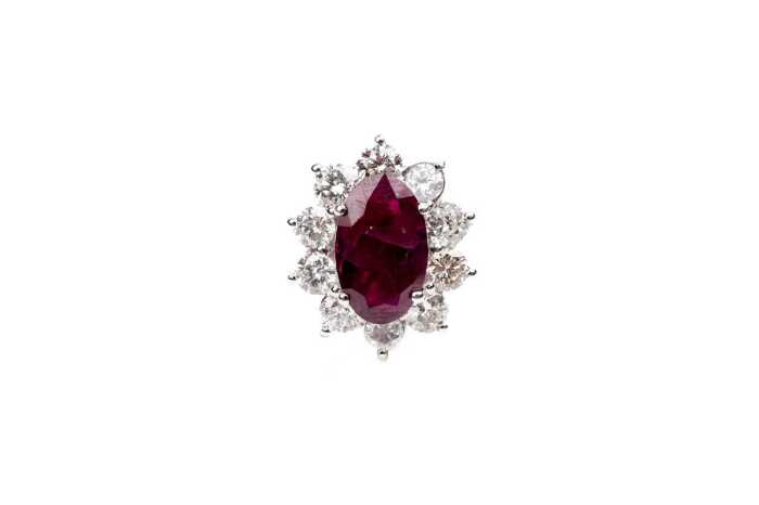 A ruby and diamond ring in 18 carat white gold