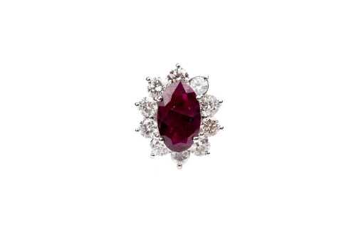 A ruby and diamond ring in 18 carat white gold